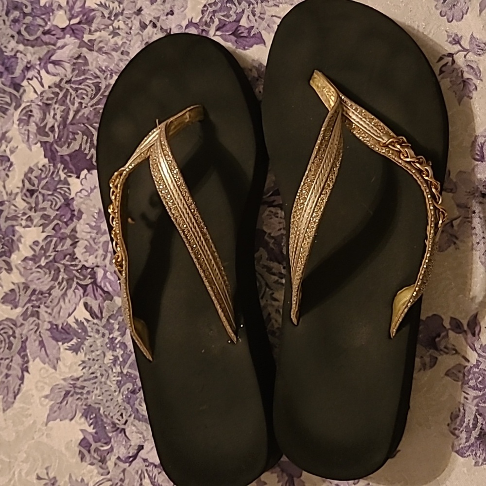 Guess gold charm flip flops